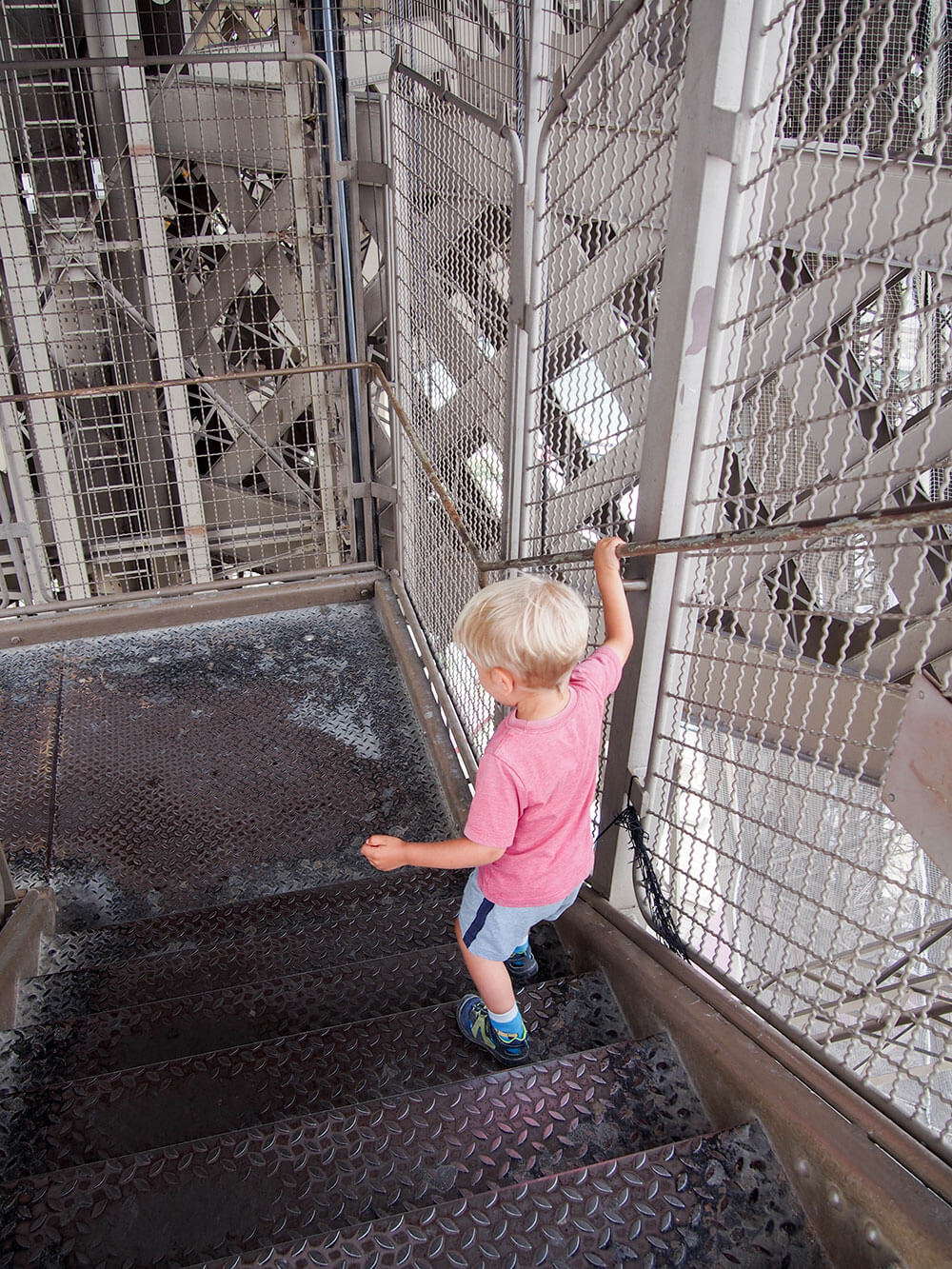 taking stairs down Eiffel tower