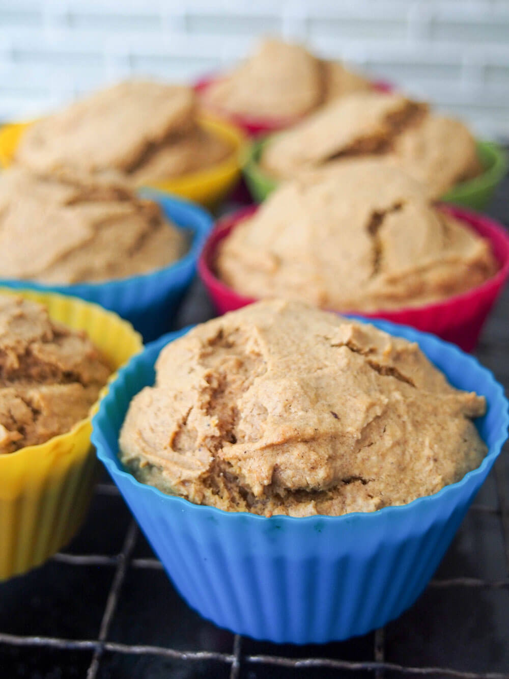 Pumpkin cupcakes cooling on cooling rack