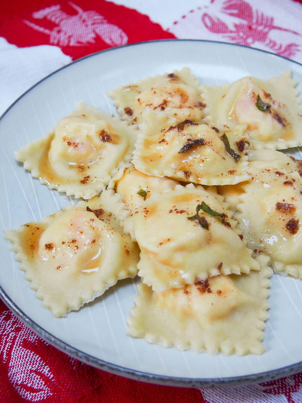 plate of lobster ravioli from side