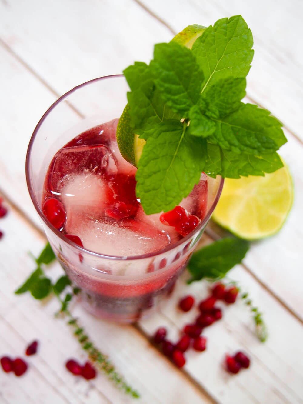 Pomegranate mojito looking in top of glass