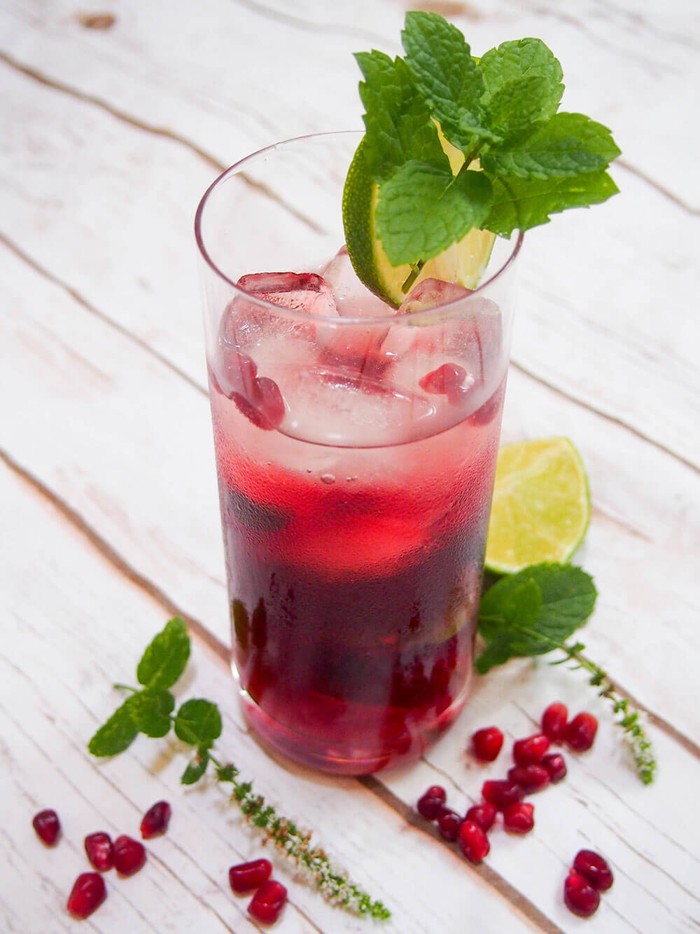 Glass of pomegranate mojito