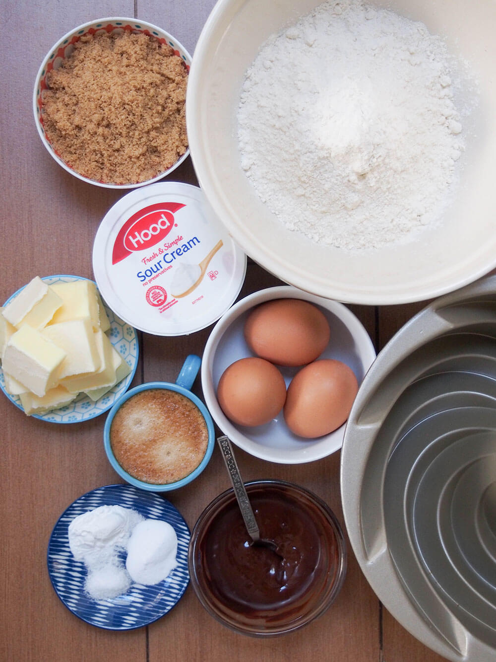 sour cream mocha cake ingredients sour cream mocha cake ingredients in separate bowls and dishes with bundt pan on edge