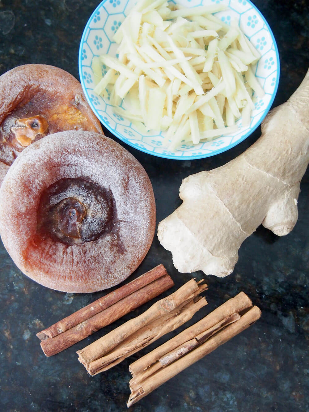 Sujeonggwa ingredients - ginger, cinnamon and dried persimmon