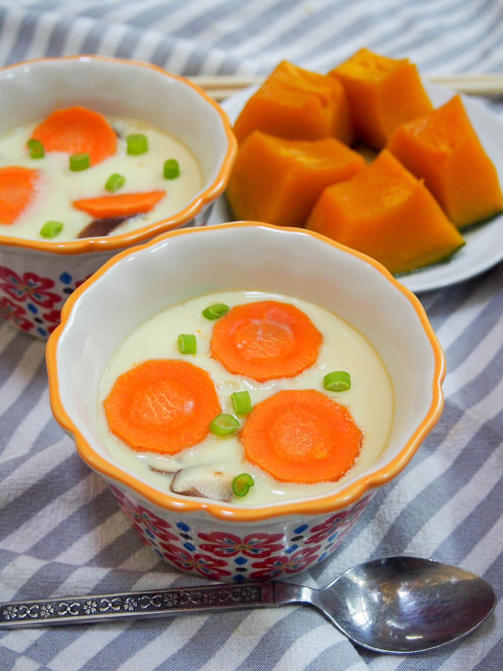Chawanmushi (Japanese savory egg custard) with kabocha behind