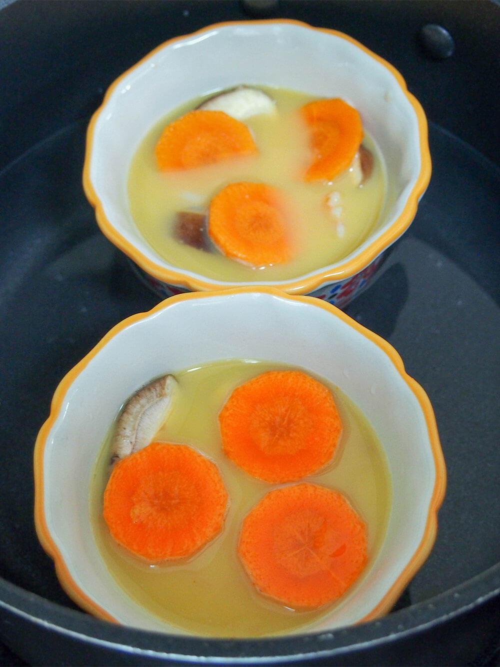 cooking Chawanmushi (Japanese savory egg custard)