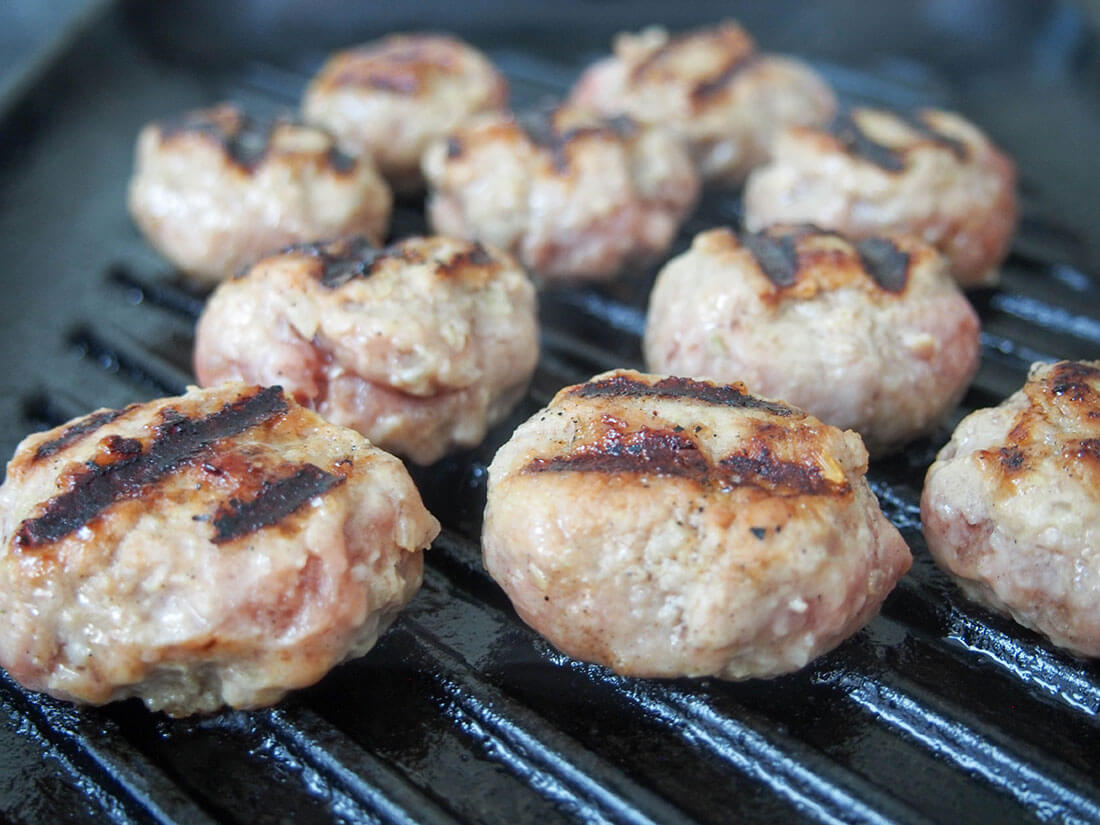 cooking the flavorful pork meatballs 