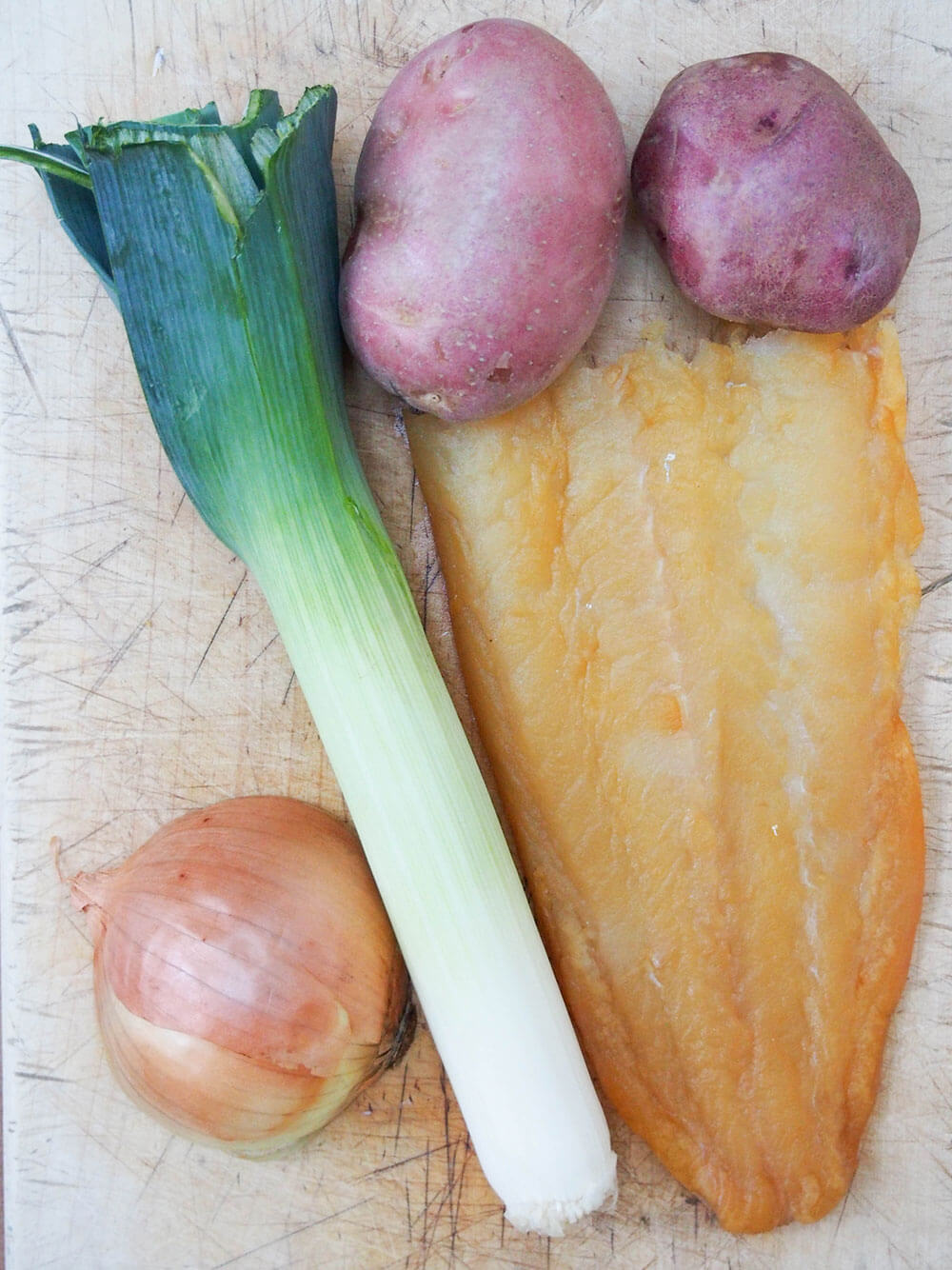 cullen skink ingredients on chopping board