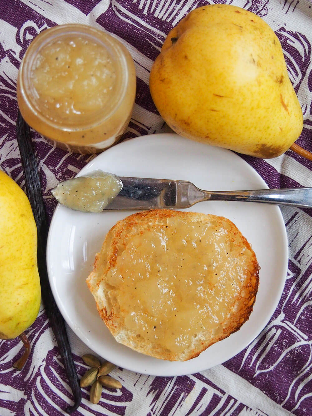 bread with pear jam on plate from overhead