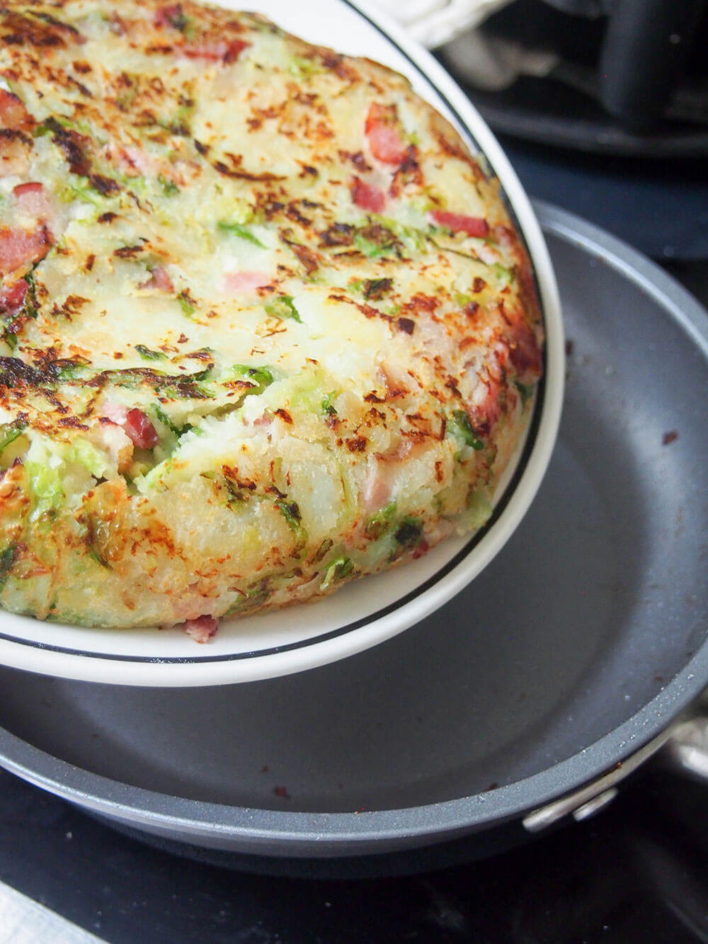 turning bubble and squeak using plate to slide back in to skillet