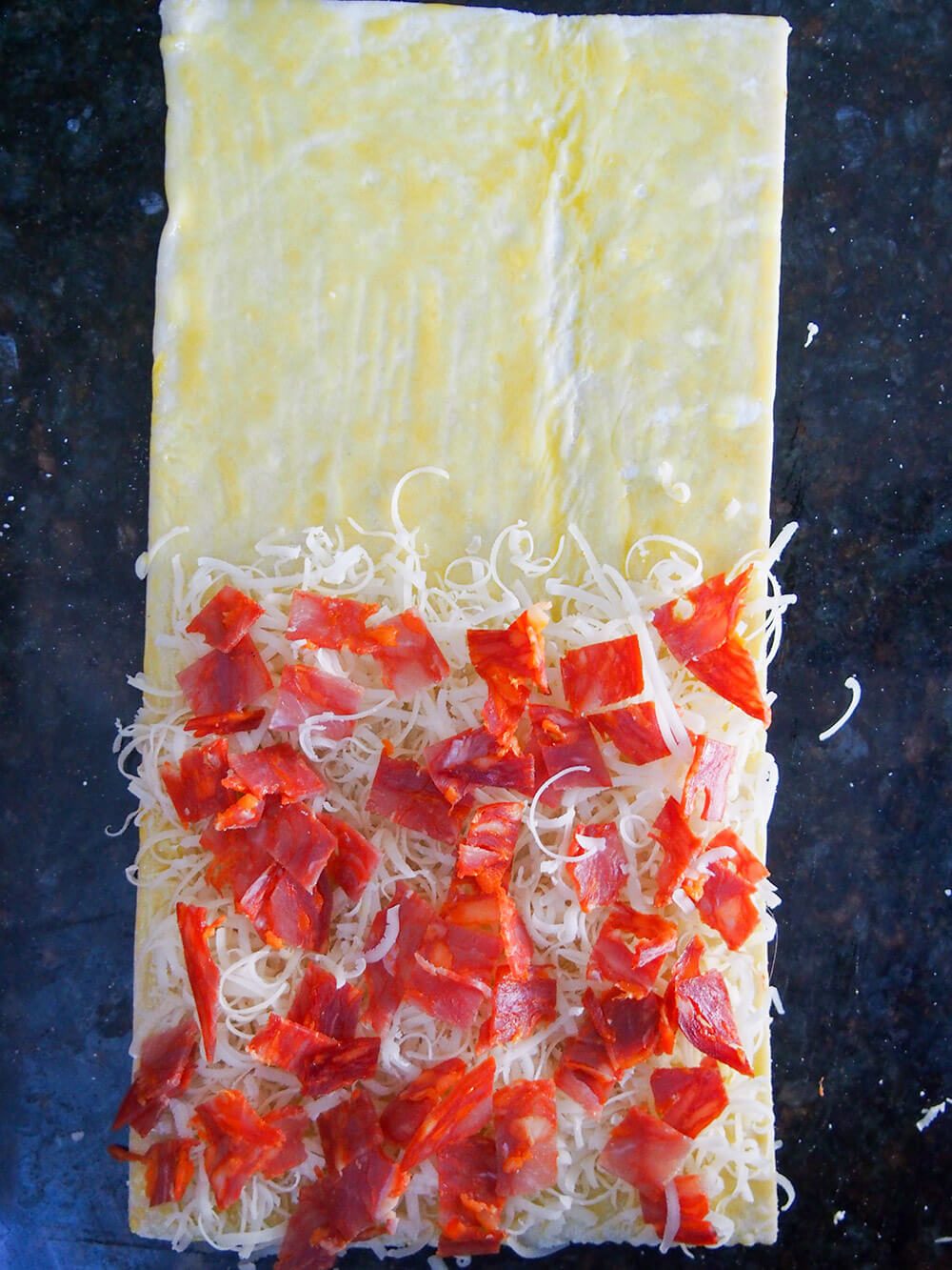 adding fillings to chorizo cheese twists