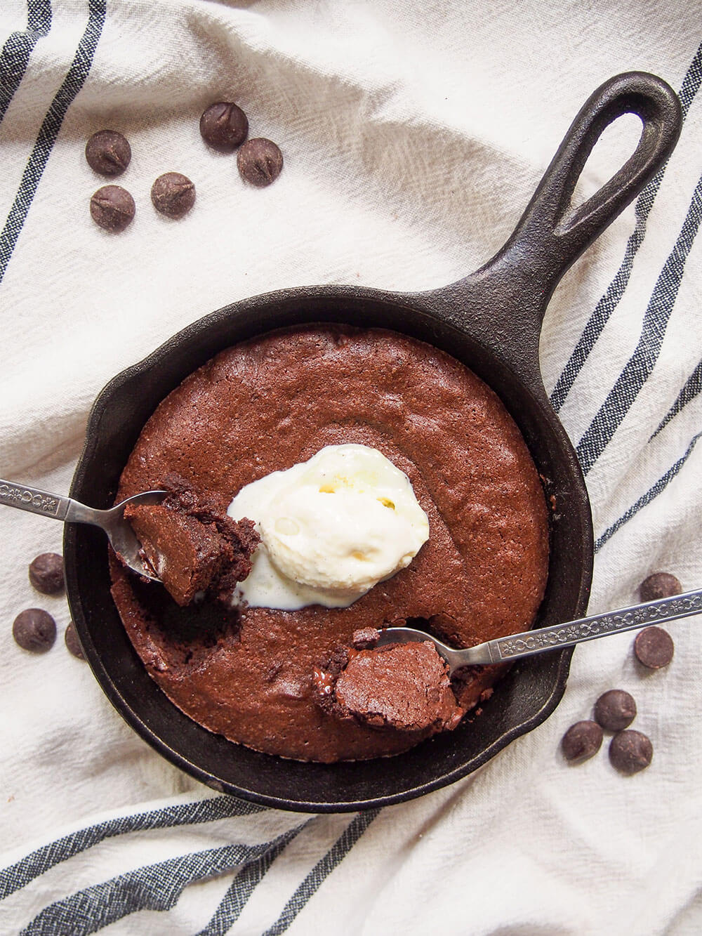 mini skillet brownie with ice cream on top viewed from overhead