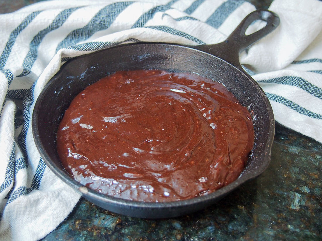 skillet brownie mixture in skillet ready to bake
