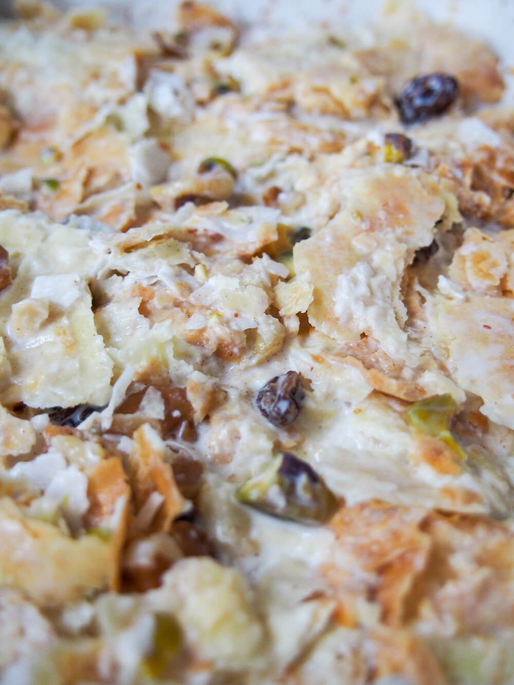 umm Ali with liquid poured over dry ingredients ready to bake