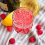 glass of lemon raspberry bellini