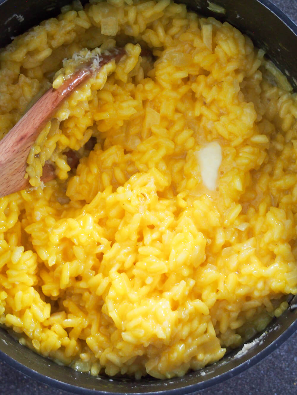 stirring butter in to finished risotto