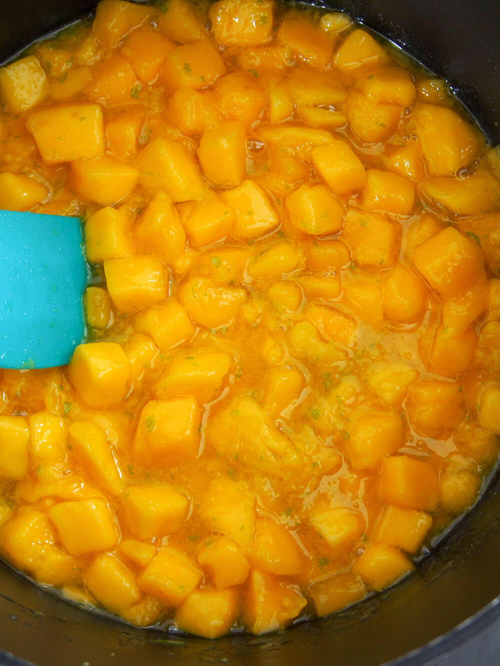 cooking down the fruit for jam