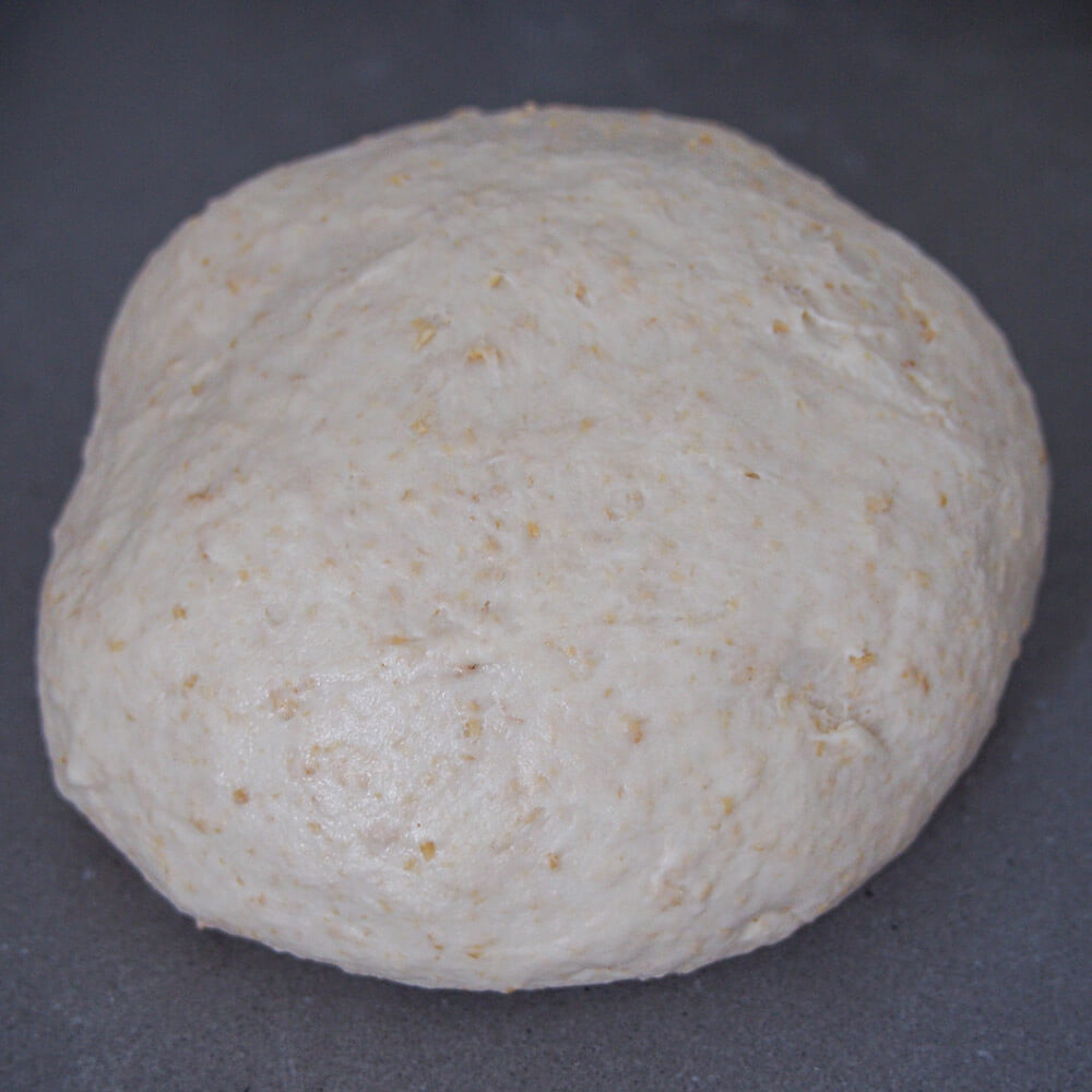 mixed sourdough pizza dough ready to leave to rise
