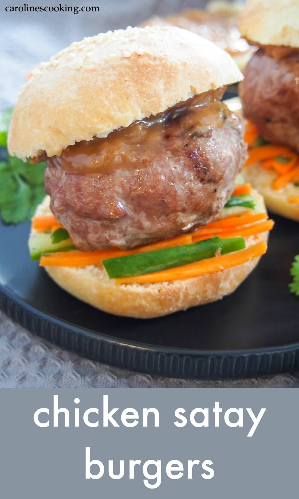 These chicken satay burgers take the flavors of the classic grilled chicken dish and put them in burger form! A delicious mix of seasoned burger, punchy peanut sauce and crunchy slaw, it's all kinds of tastiness. It's great for preparing ahead, too. #burger #grilling #satay