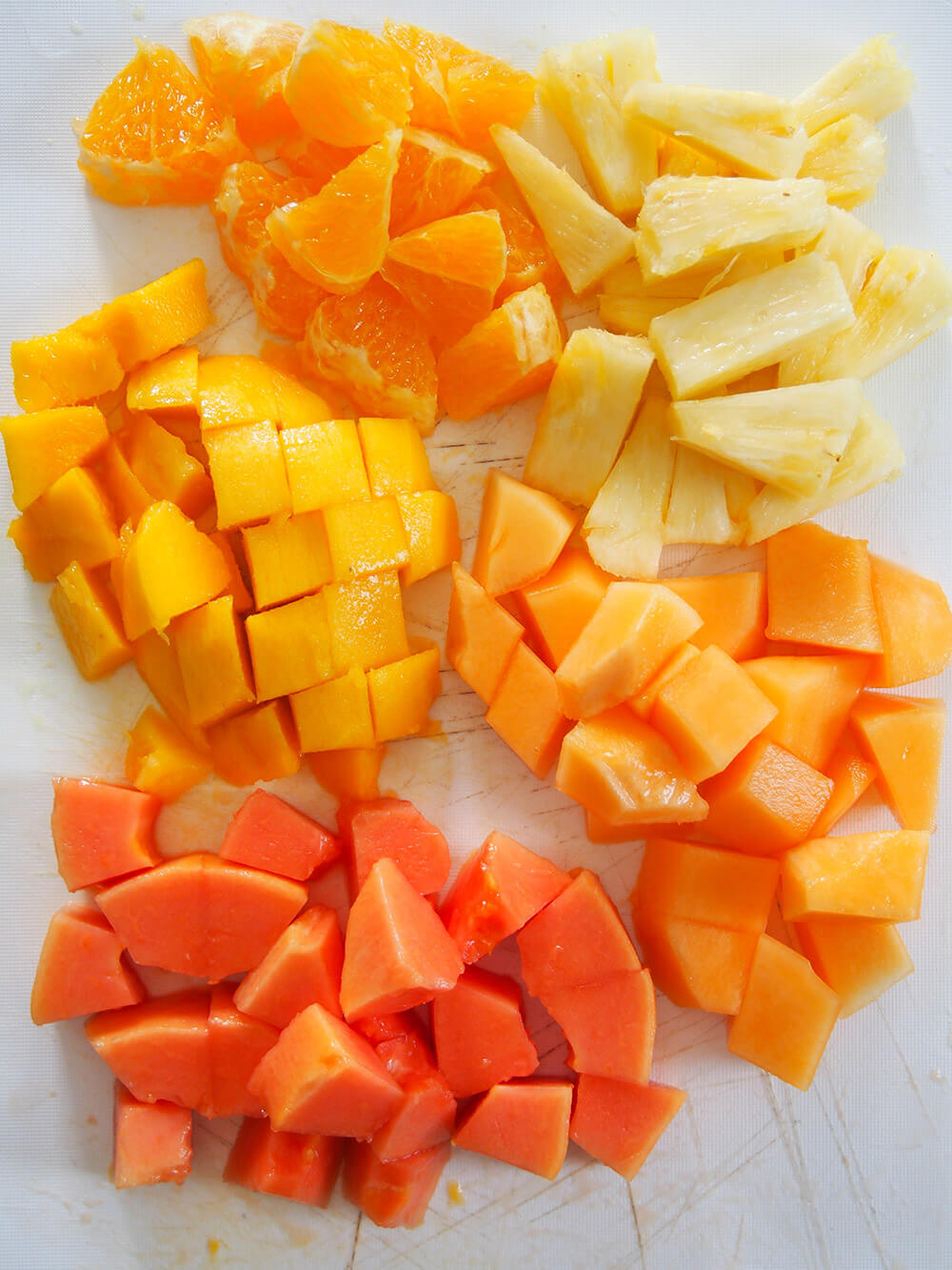 various chopped fruit ready to make into salad