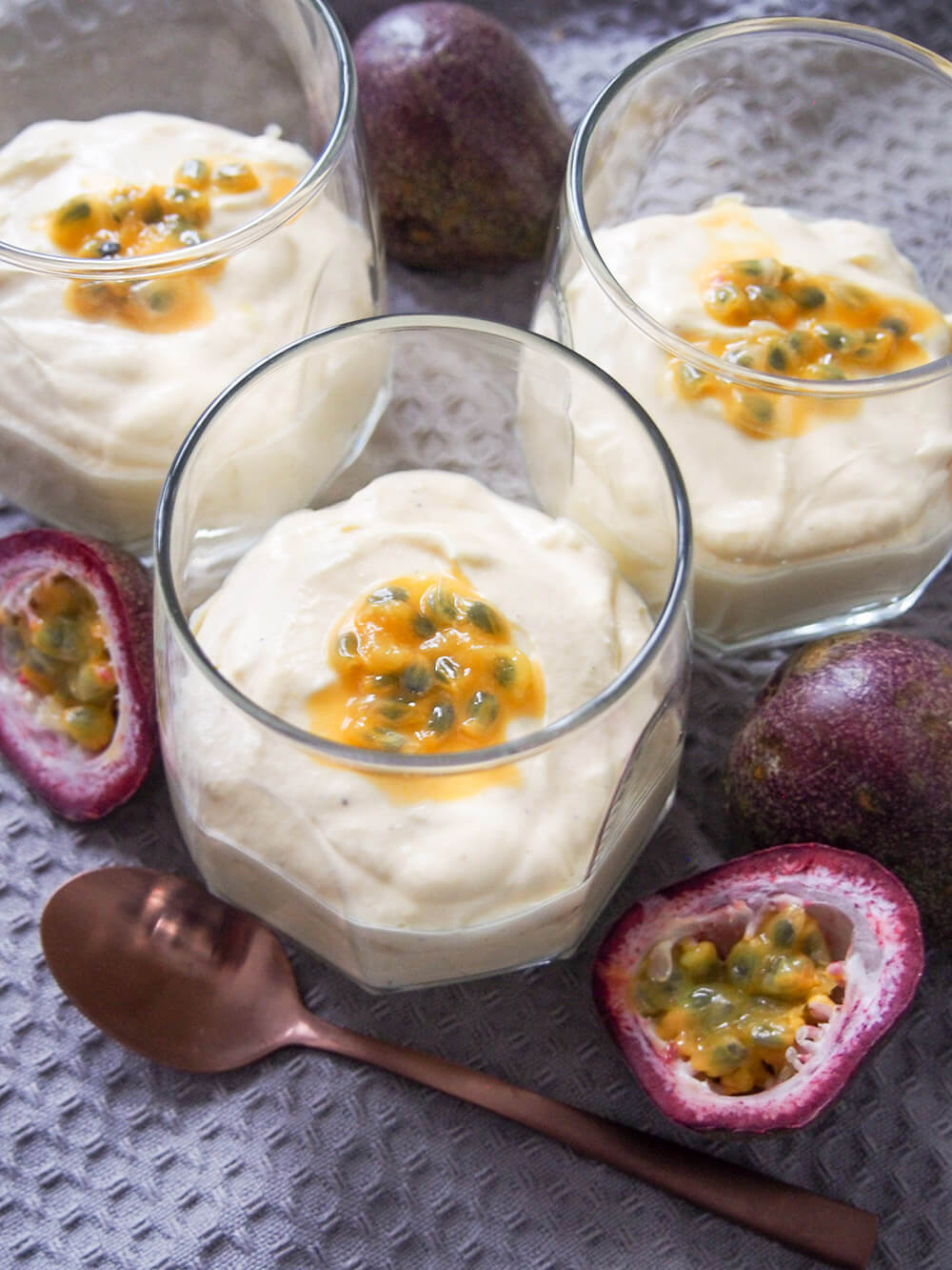 passion fruit mousse (mousse de maracuja) with additional fresh passion fruit on top