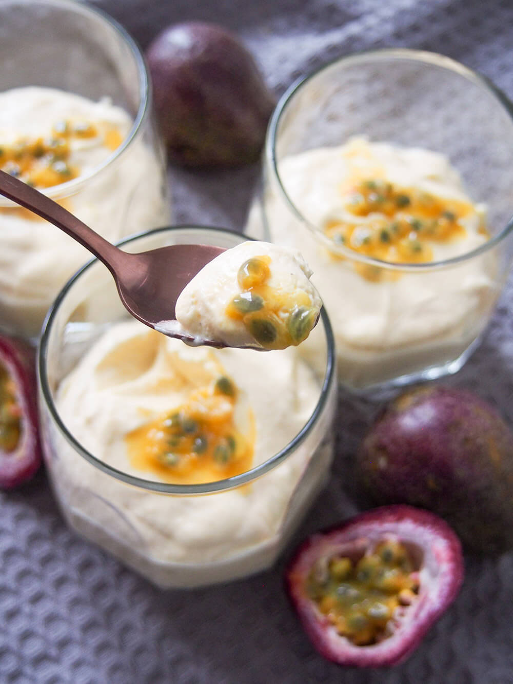 passion fruit mousse (mousse de maracuja) with scoop on spoon