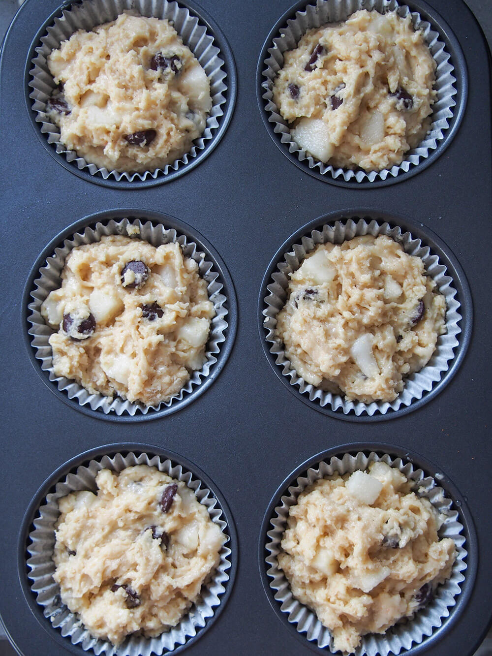 mixture divided between muffin cases