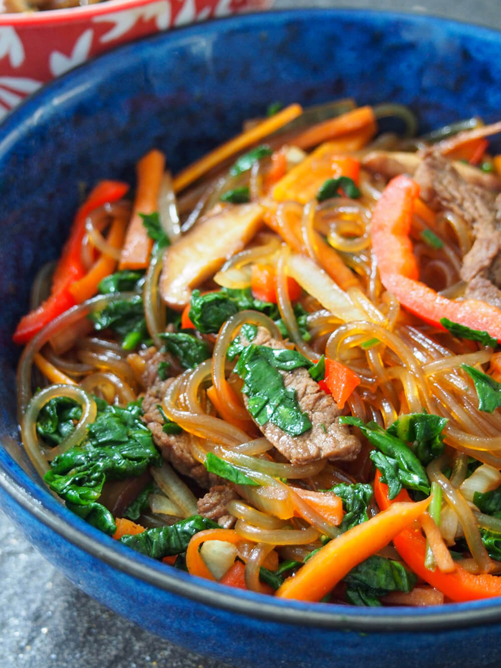 side view of bowl of japchae