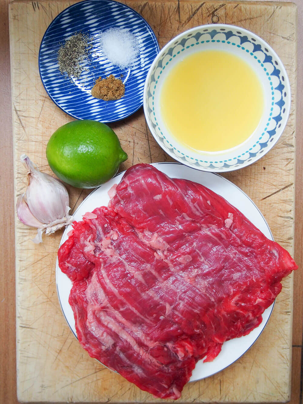beef and marinade ingredients to make carne asada
