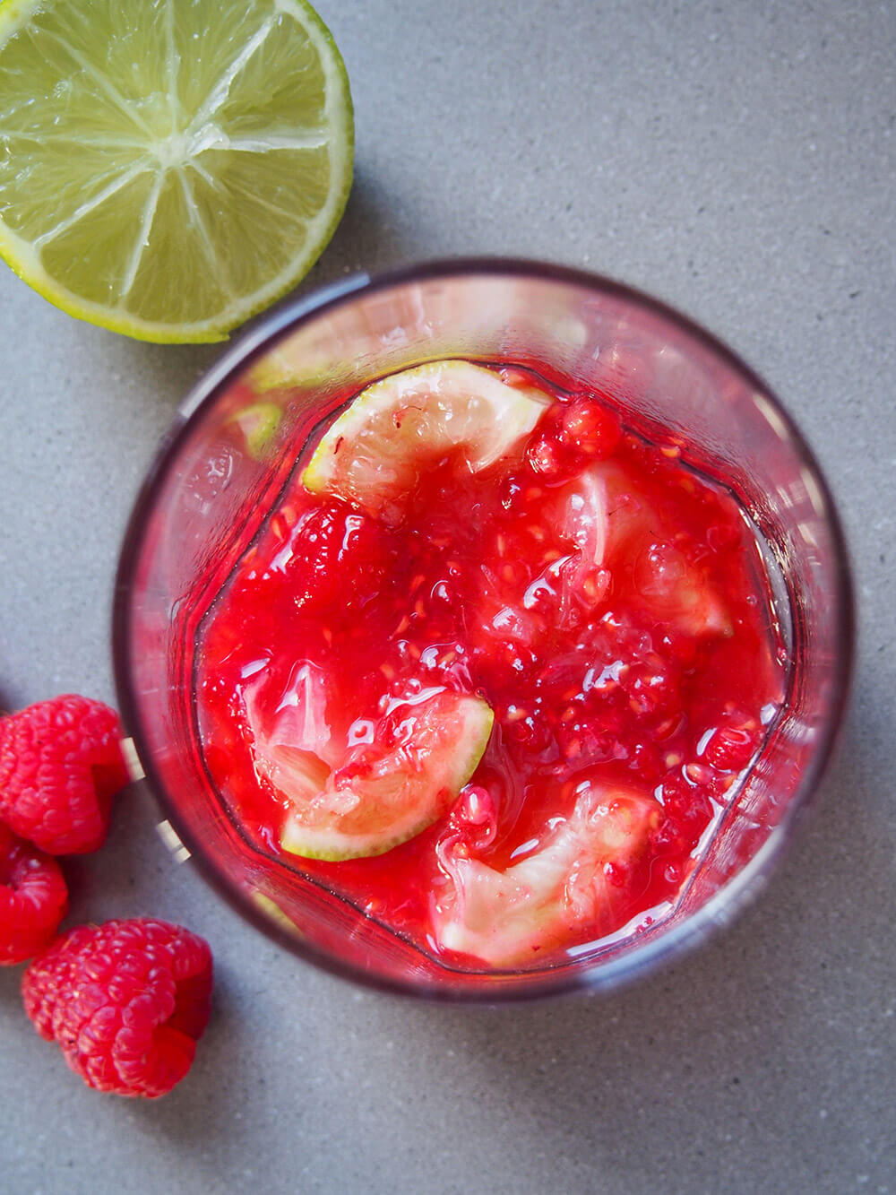 muddled fruit in glass for cocktail