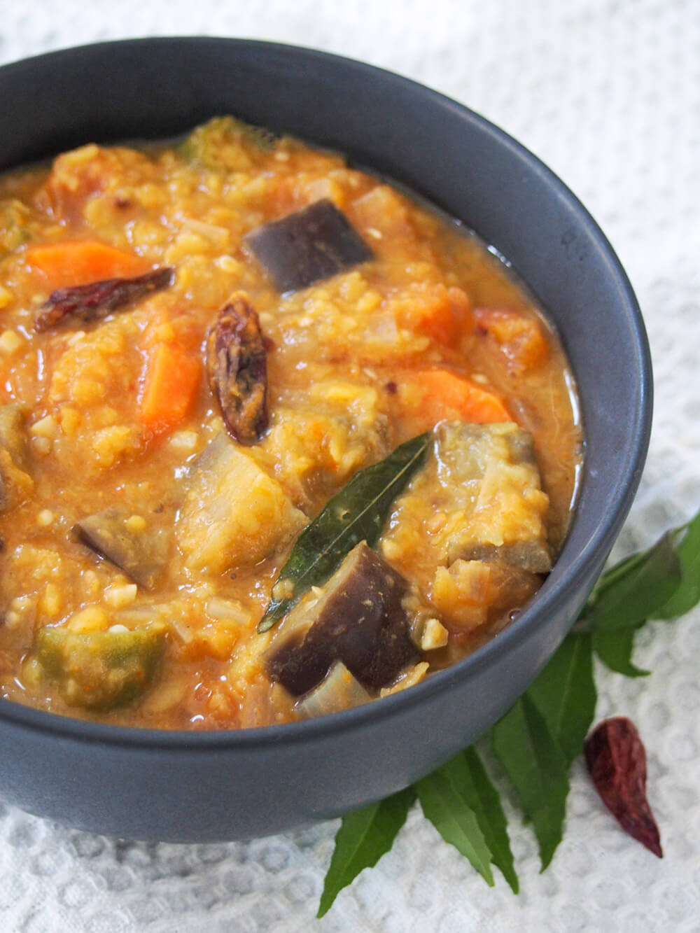 side view of bowl of Kerala style sambar