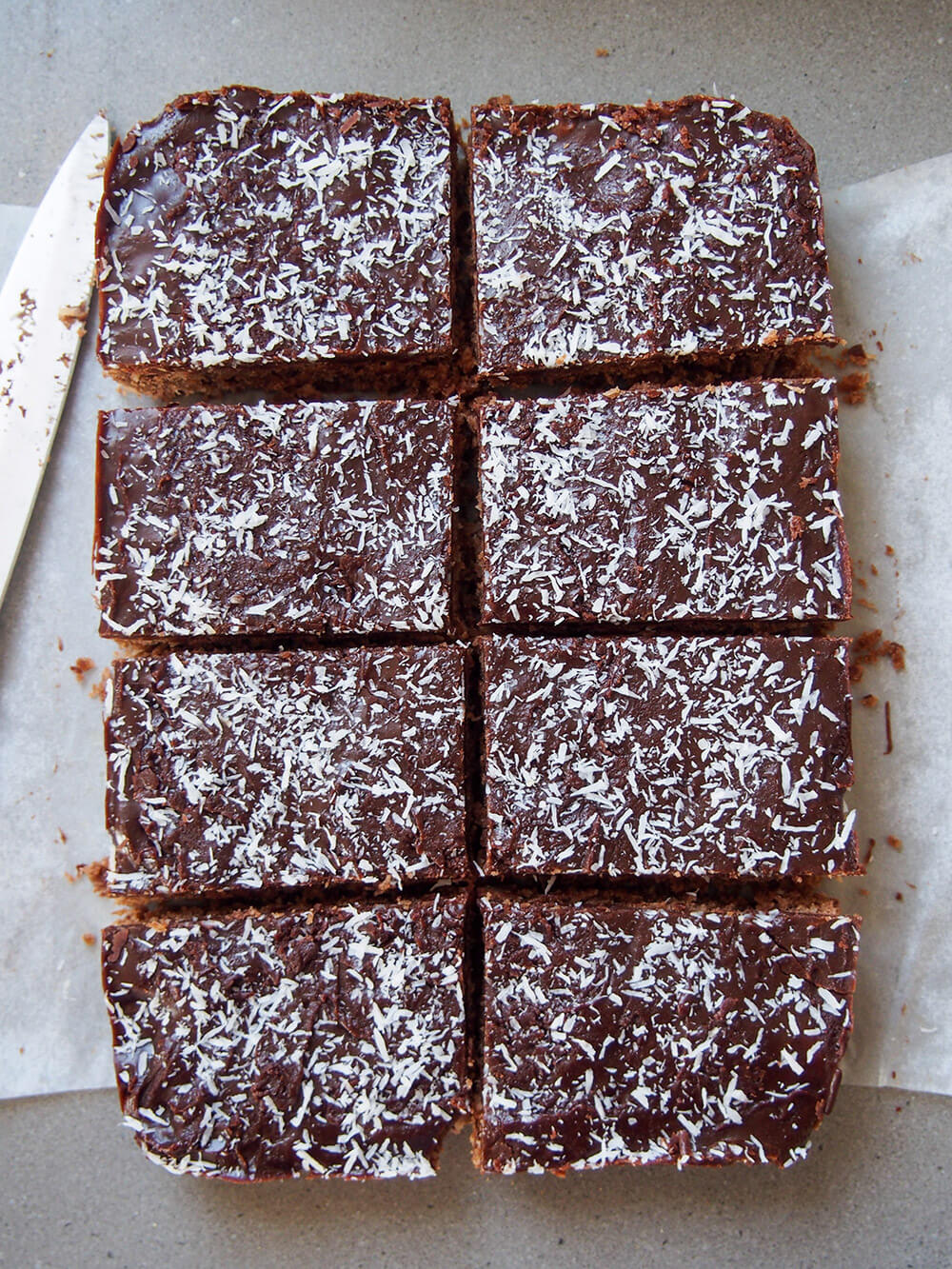 cutting up chocolate slice