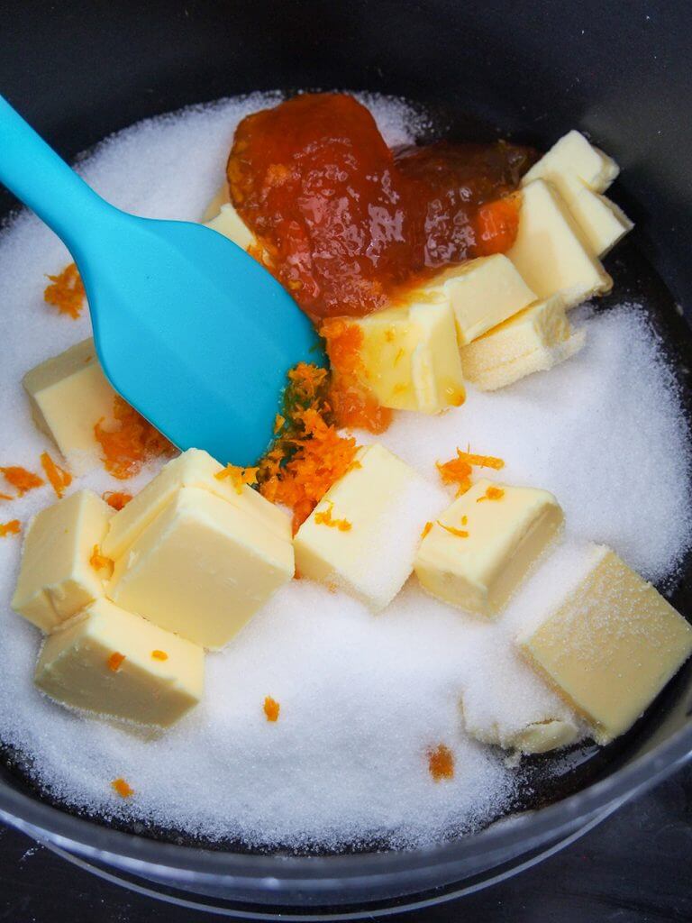 honey, sugar, butter, orange zest and jam in pan