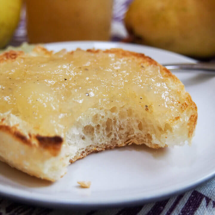 bread with pear jam with bite taken out