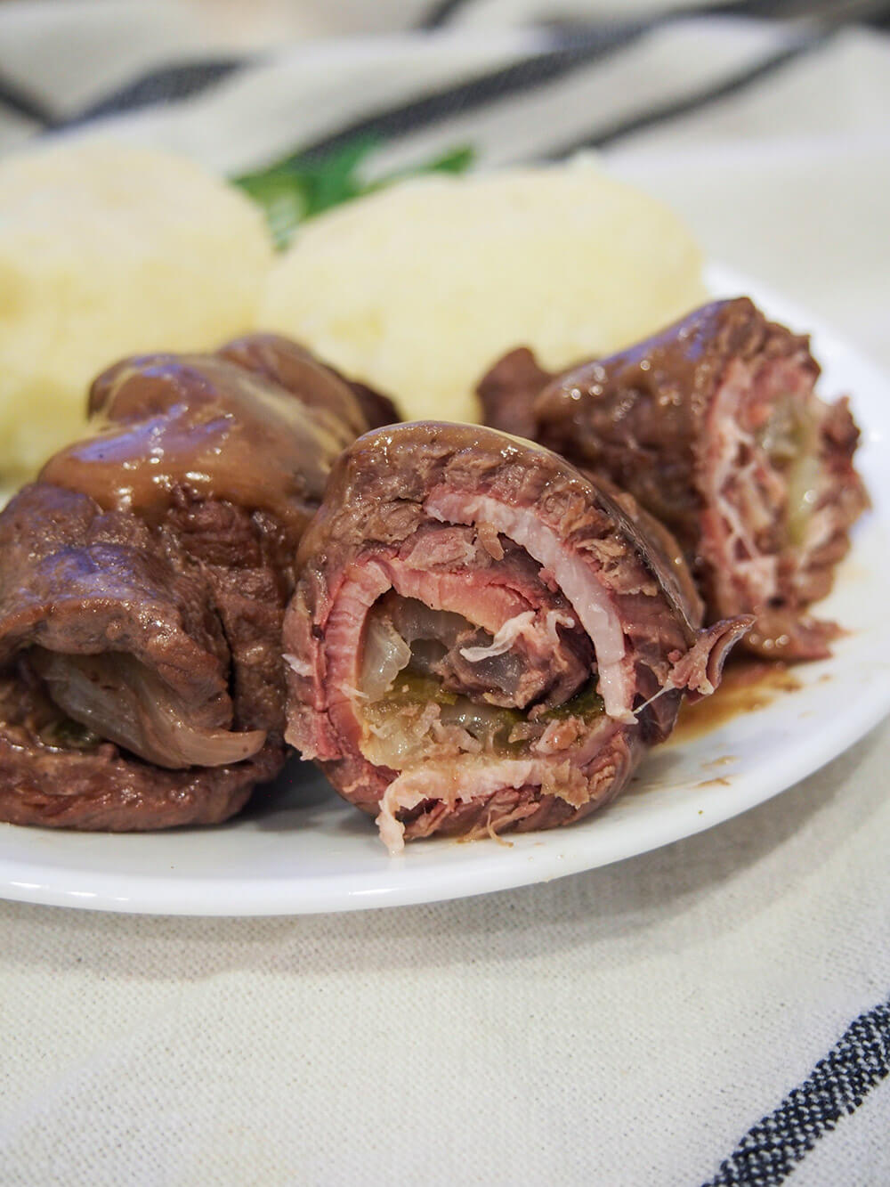 beef rouladen cut open showing fillings