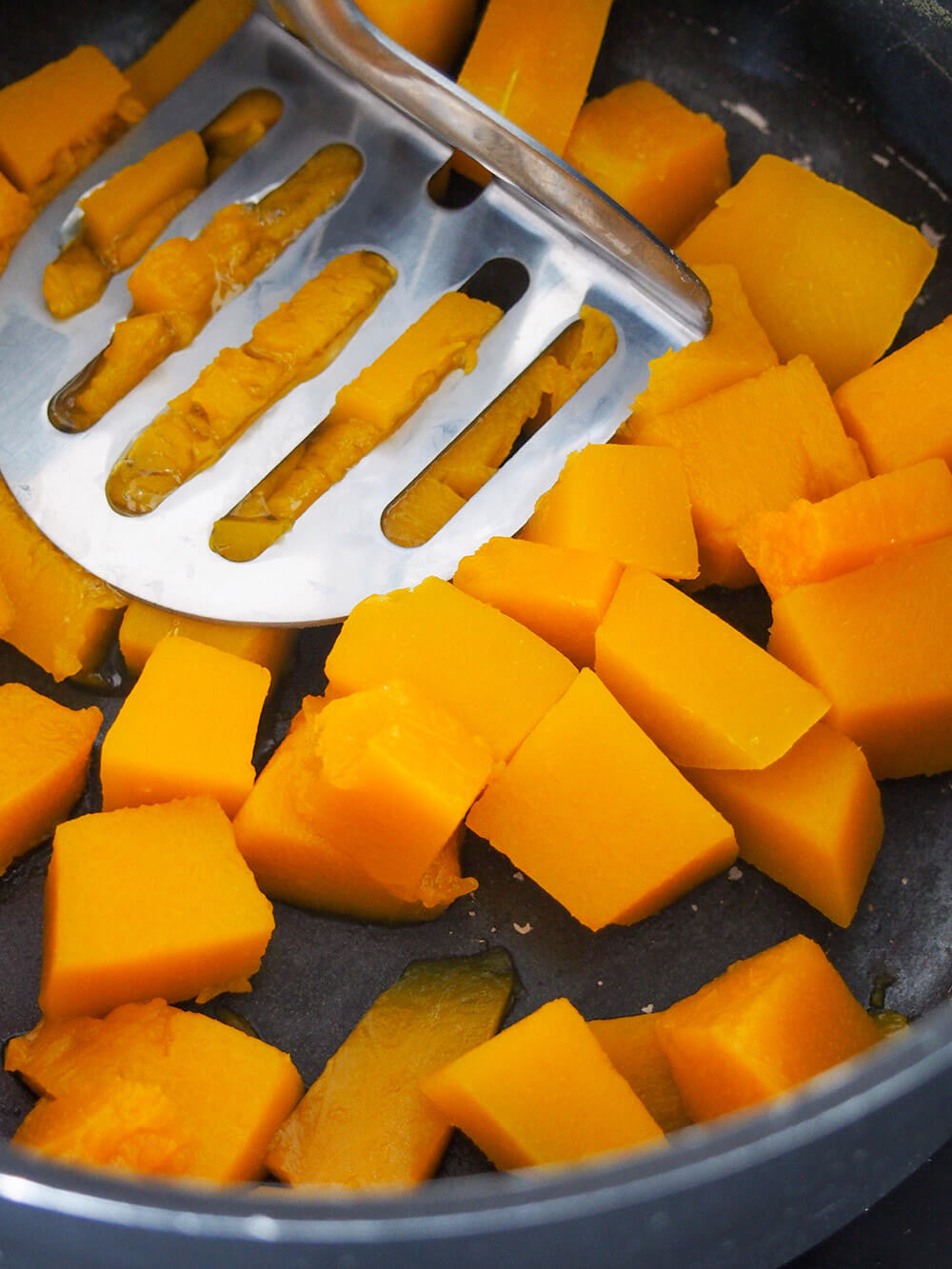 mashing pumpkin