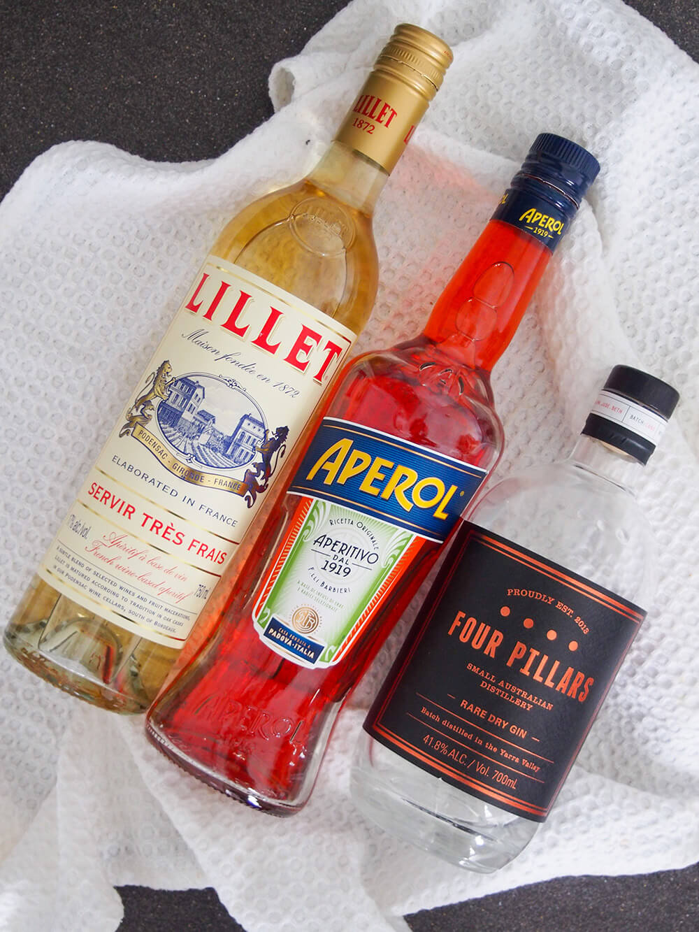 bottles of ingredients for unusual negroni bottles of ingredients for unusual negroni
