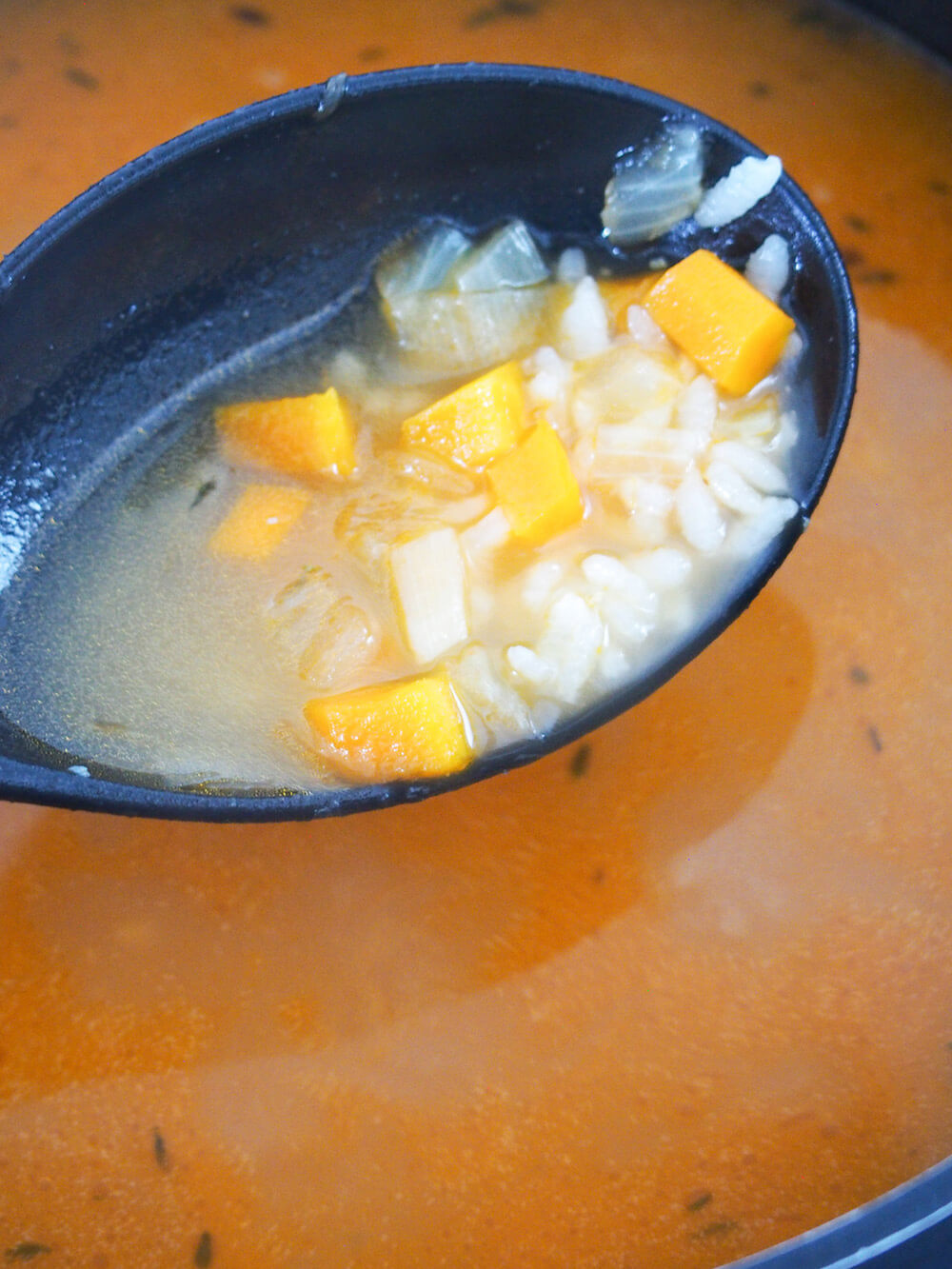 cooked rice and vegetables in broth base for shrimp bisque cooked rice and vegetables in broth