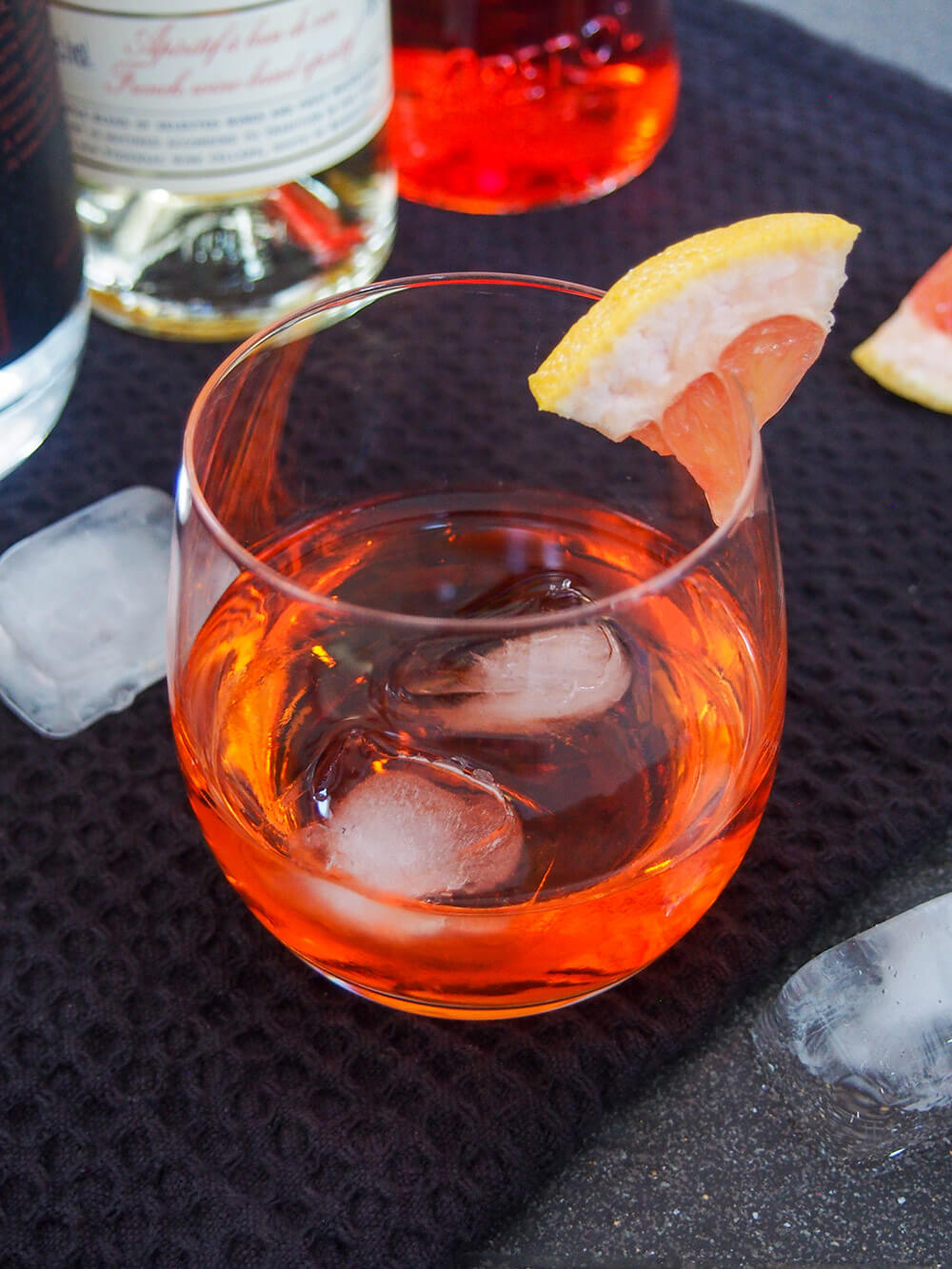 This unusual negroni has the same style of flavors as the classic, but is that bit more mellow and aromatic. Easy and wonderfully sippable. unusual negroni with grapefruit garnish