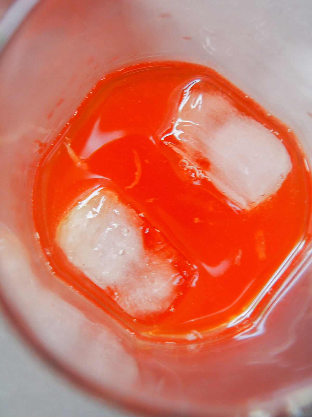 cocktail mixture with ice, ready to shake to chill