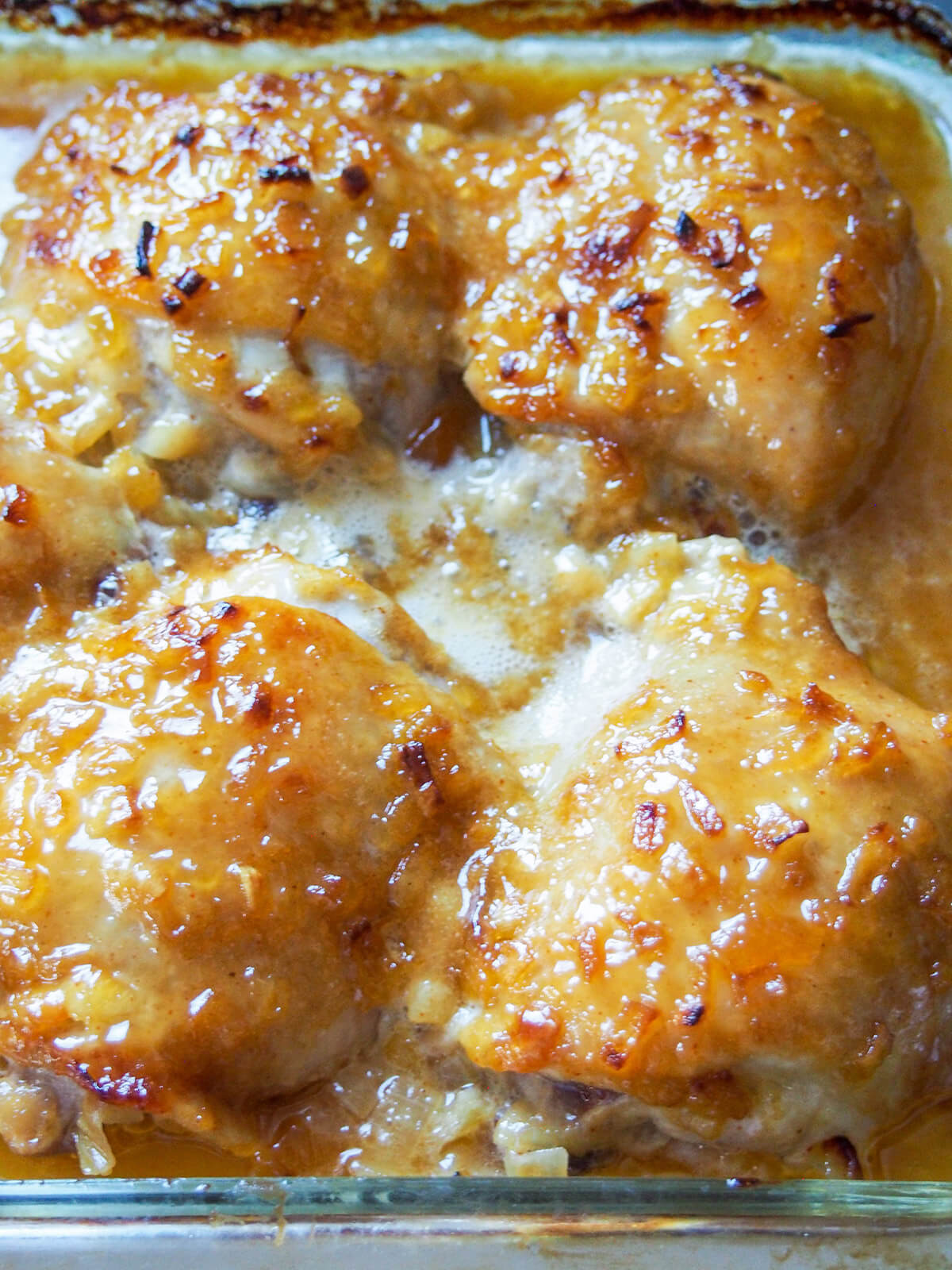 cooked chicken in dish straight out of oven