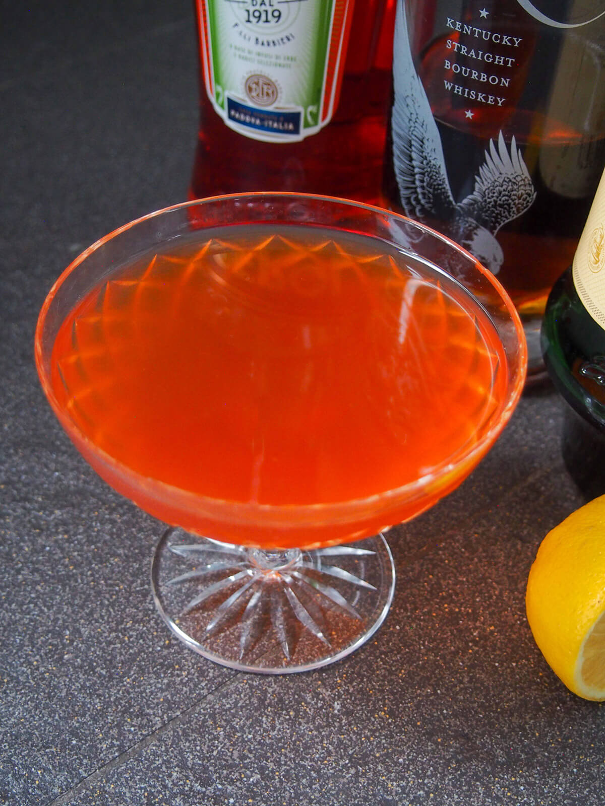 paper plane cocktail viewed from overhead