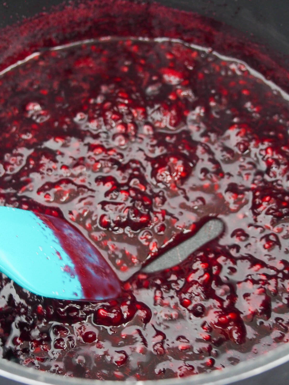 stirring jam with spatula