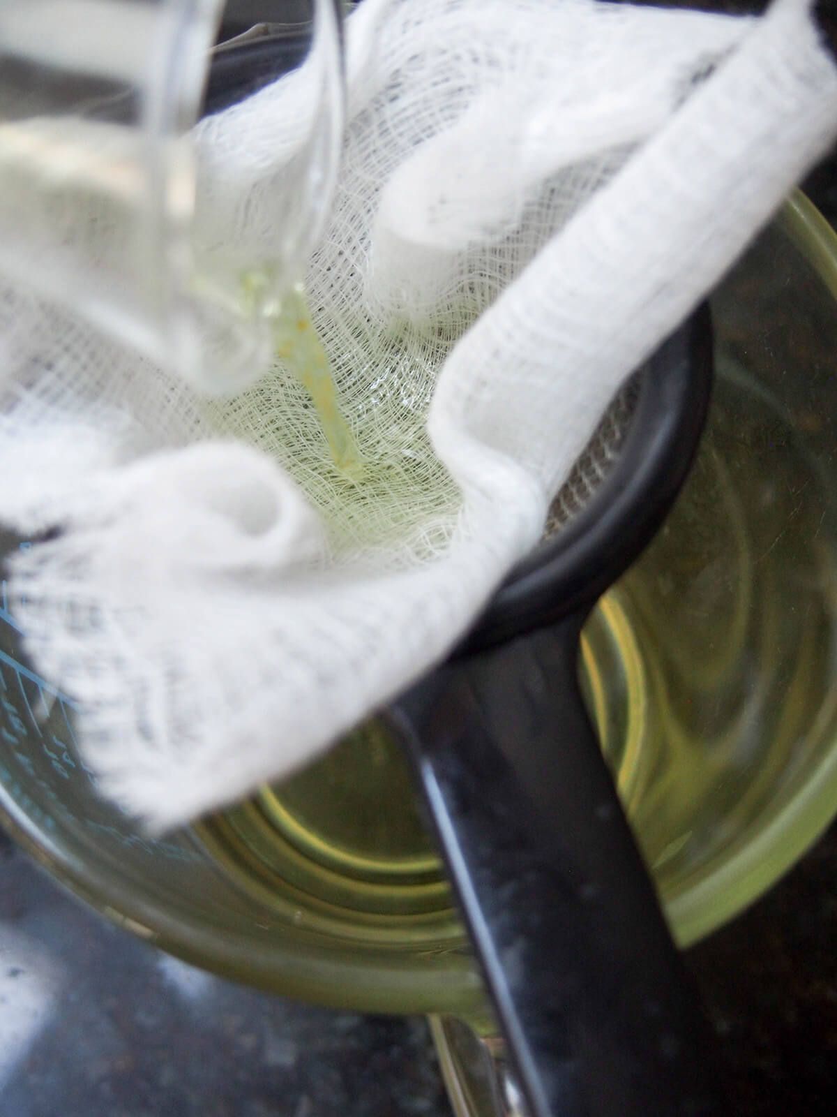 straining infused spirit