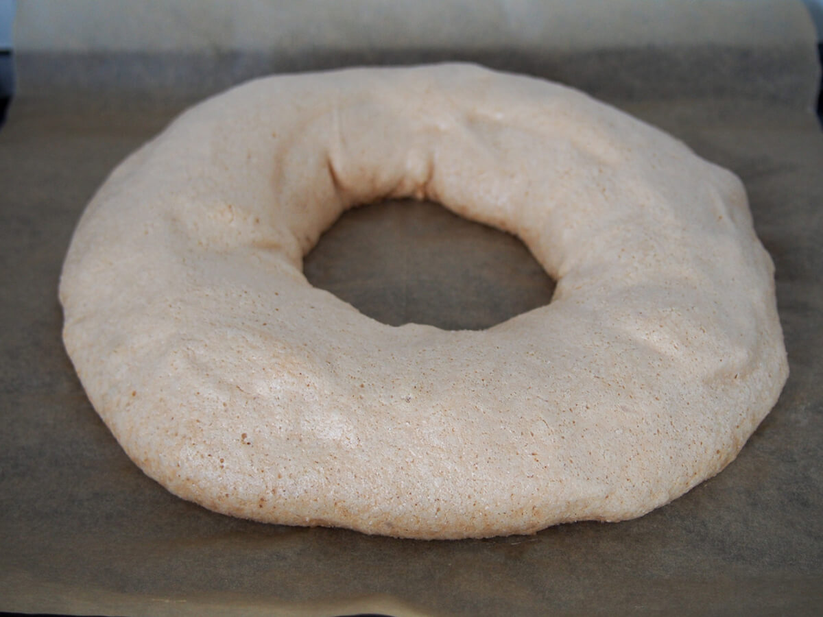 cooked pavlova on parchment out oven