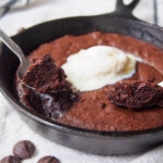 mini skillet brownie with spoonfuls on top