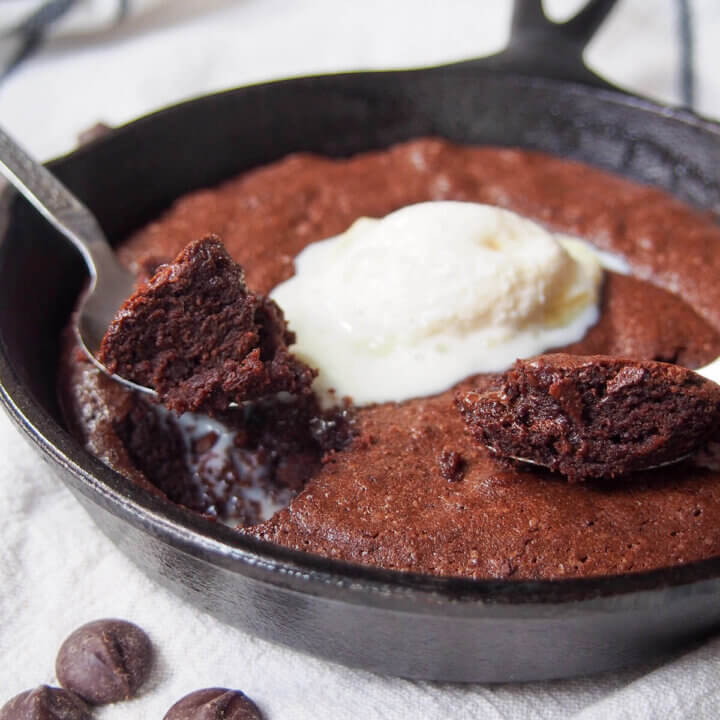 mini skillet brownie with spoonfuls on top
