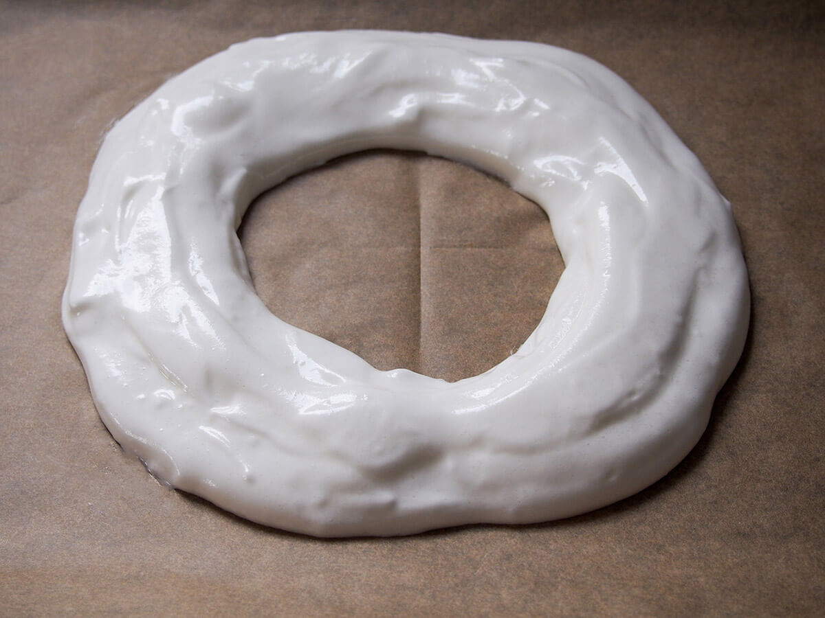 meringue mixture in ring ready to bake