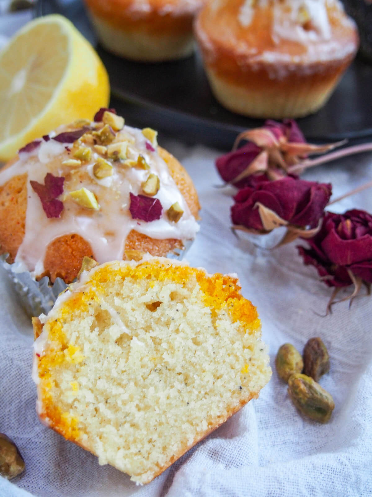 Persian love cake cupcake cut open showing saffron drizzle coloring