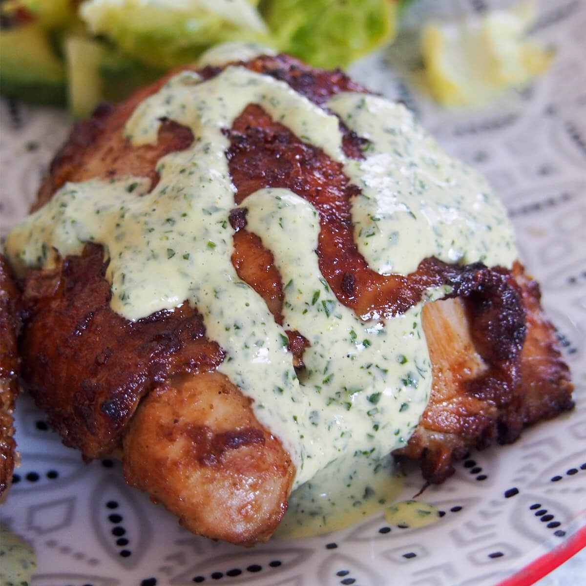 Aji verde, often called Peruvian green sauce elsewhere, is wonderfully easy and flavorful. It gets it's color from cilantro and has a little kick from aji amarillo, a popular Peruvian chili. Fresh, flavorful, and perfect over roast chicken and so much more. pollo a la brasa (Peruvian chicken) topped with aji verde sauce