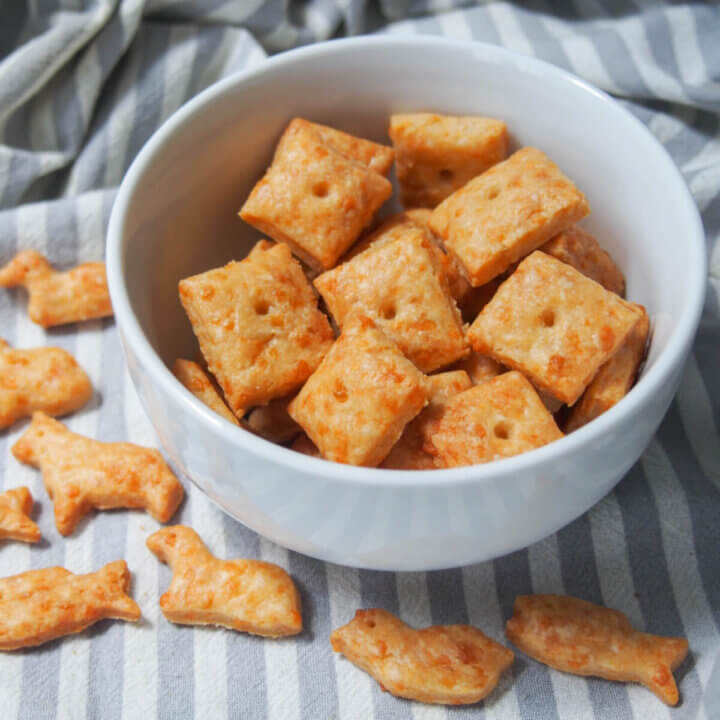 homemade cheese crackers in bowl with animal shapes ones below